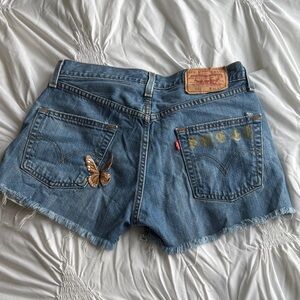Vintage Levi's Classic Blue Jean Shorts with Butterfly Accent